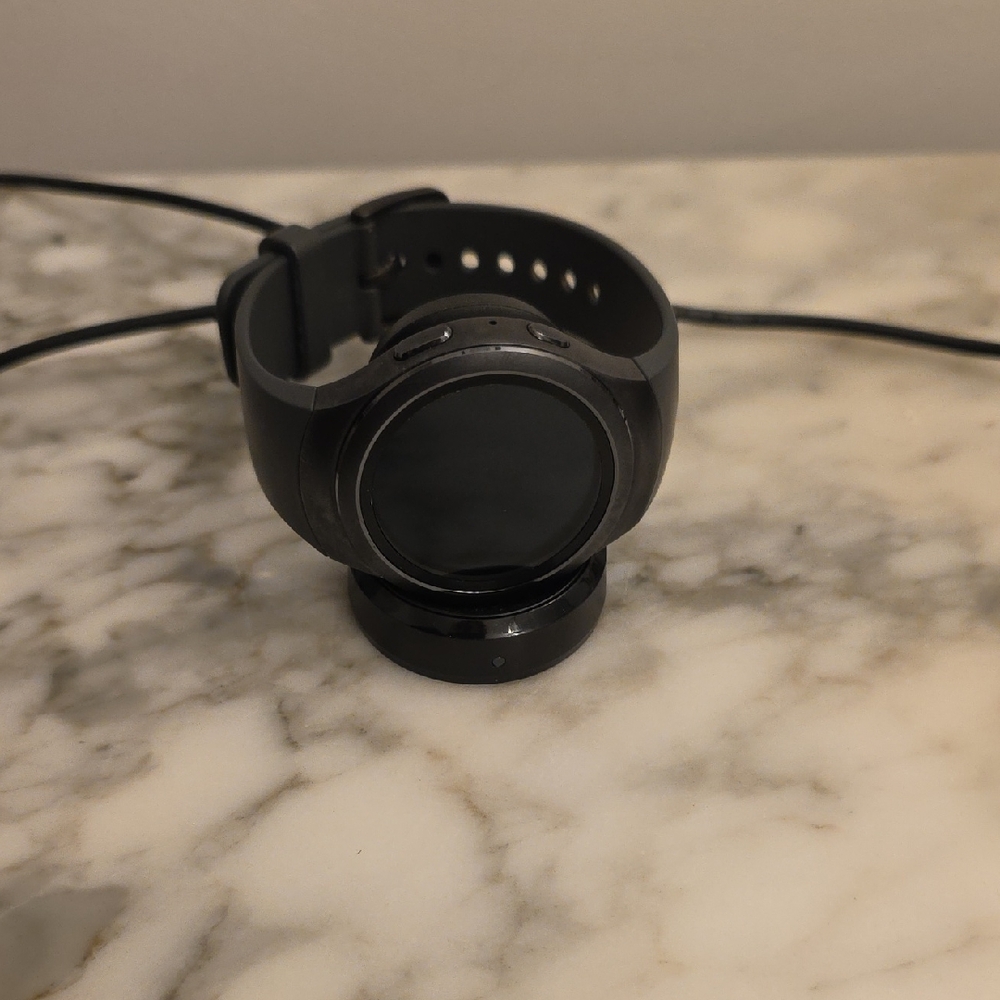 Samsung Smartwatch with Charging Stand.
